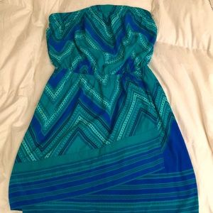 Blue and green strapless dress.